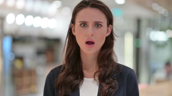 Portrait of Disappointed Businesswoman Reacting to Loss alt