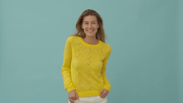 Woman in Yellow Posing