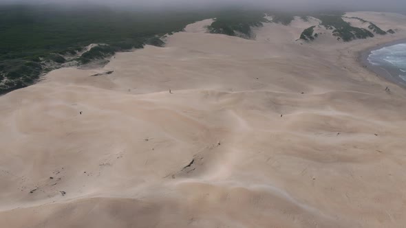 High Angle View of Person Seen Walking on Sand Dune