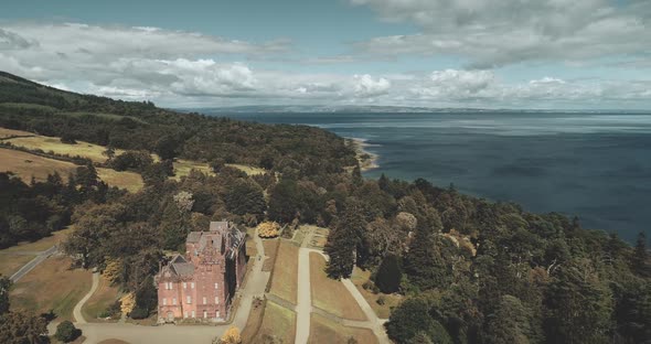 Scottish Ocean Brodick Castle Aerial View with Magnificent Landscape at Atlantic Green Coastline alt