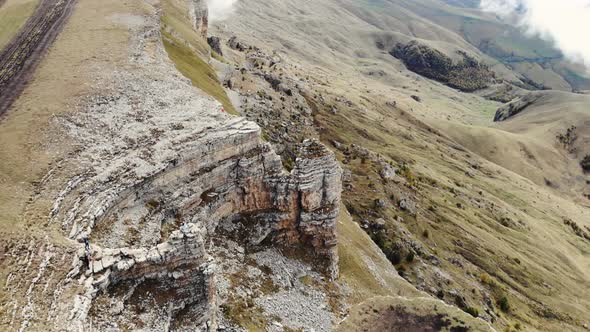 Aerial View of Stone Amphitheater in Thick Clouds Bermamyt Plateau Caucasus alt