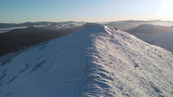  Aerial Slider Shot of Snow Covered Summit