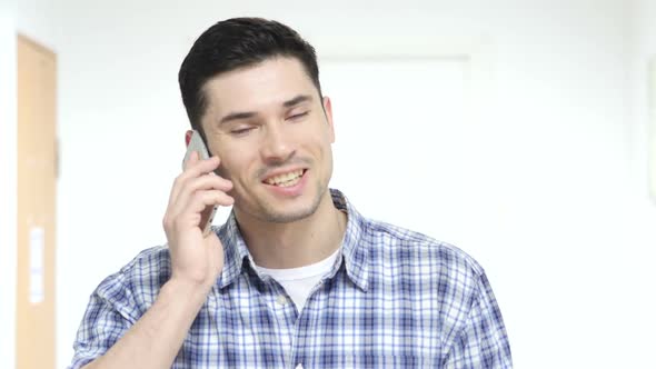 Man Busy with Phone Talk Negotiation on Mobile alt