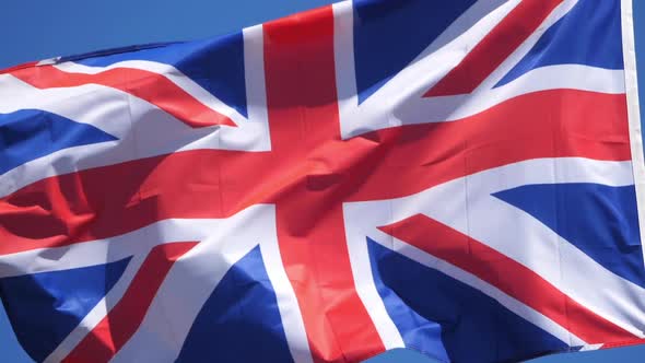 The national British flag waving in the wind. alt