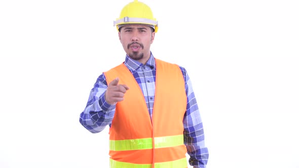Angry Bearded Persian Man Construction Worker Pointing at Camera alt