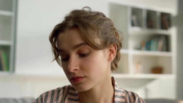 Student Watching Webinar Home Closeup alt