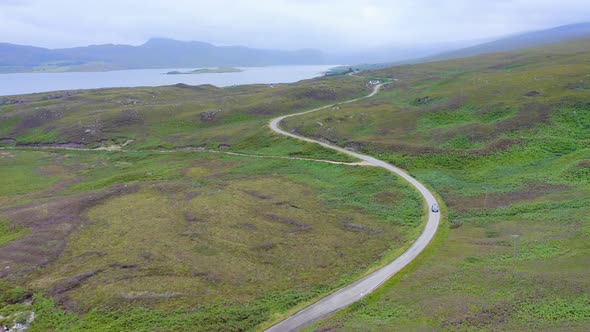 Aerial Drone View of Scotland Highlands Road Trip Vacation of NC500 (North Coast 500 Route), Driving alt
