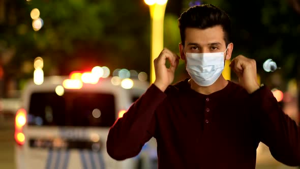 The young male in a medical mask alt