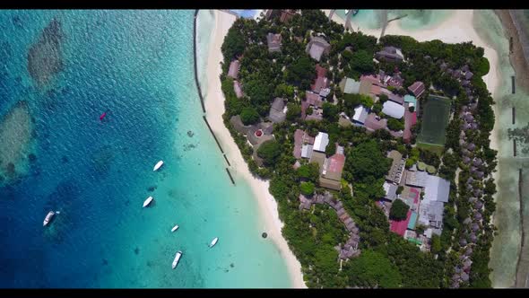 Aerial drone view travel of paradise coastline beach voyage by blue lagoon and white sand background alt