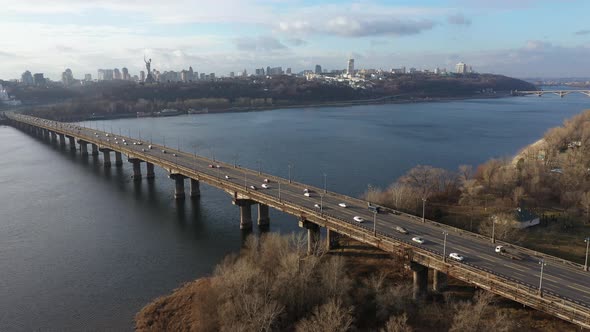Urban Traffic on a Patona Bridge Over a River, View of the Kiev Pechersk Lavra