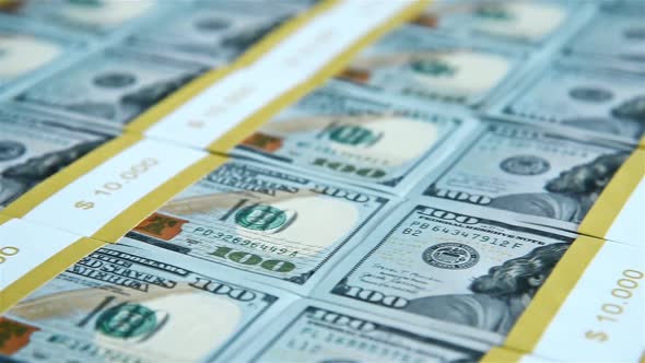 Many Hundred Dollar Bills Background. alt