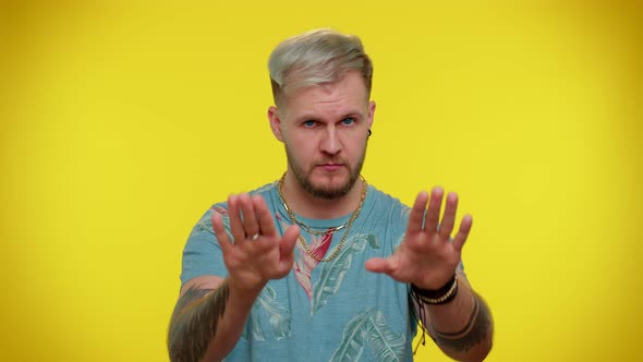 Bearded Man Warning with Admonishing Finger Gesture Saying No Be Careful Advice Avoid Danger alt