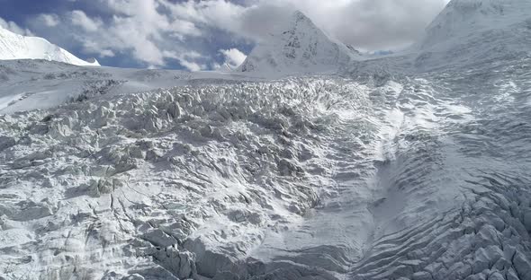 Aerial footage of drone flying over glacier lagoon in Tibet,China.Aerial footage alt