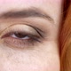 Brown Eye of a Woman With a Foxy Hair - VideoHive Item for Sale