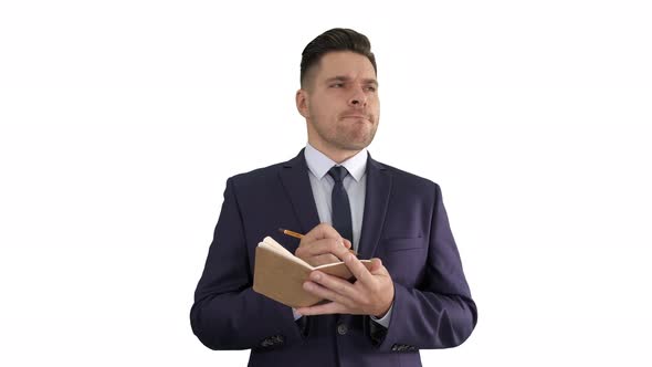 Businessman Putting Down Ideas and Filling in Checklist on White Background. alt