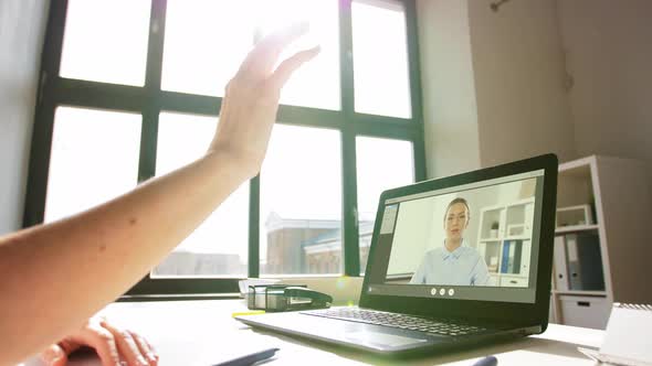 Woman with Laptop Having Video Call at Office