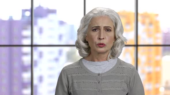 Portrait of Sad Old Lady with Toothache alt