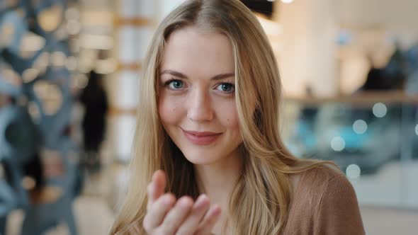 Beautiful Caucasian Girl Flirting Seductive Woman Showing Hey you Come Here Gesture Shows Direction alt