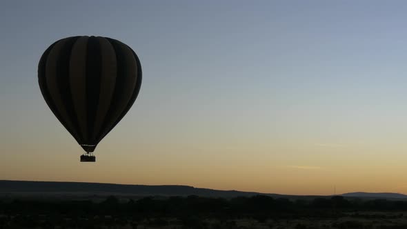 Hot air balloon at dawn alt