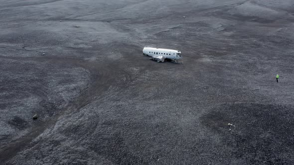 Aerial of an Abandoned Crashed Plane Wreckage on Solheimasandur Beach Iceland alt