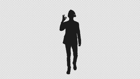 Silhouette of Young Man in Santa Hat Moving Forward and Showing Okay Sign, Alpha Channel