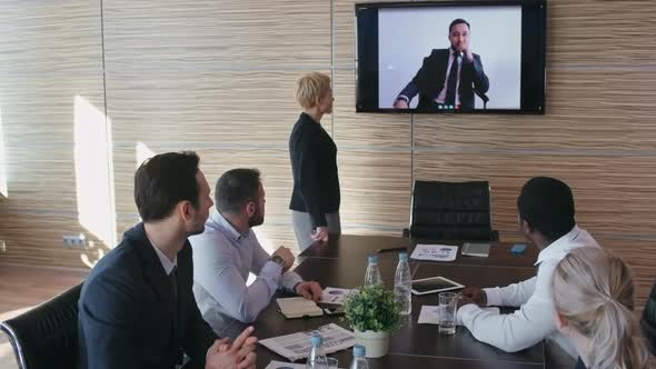 Business Team at Video Conference alt