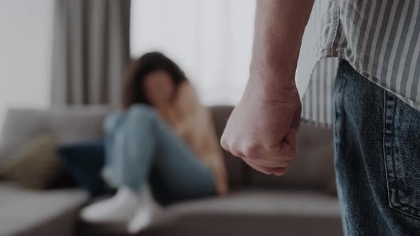 Woman Scaring and Protection of Man Beating Up Beaten and Raped Sitting in the Corner Violence alt