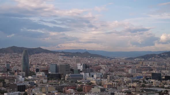 Panoramic View of Barcelona Multiple Building's Roofs on Cloudy Day