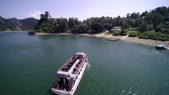 Lake view from the air. Holidays. Ships, tourists, people