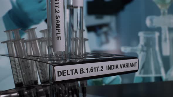 Delta B.1.617.2 Indian Variant Test Tube Samples Being Removed From Rack. Locked Off alt