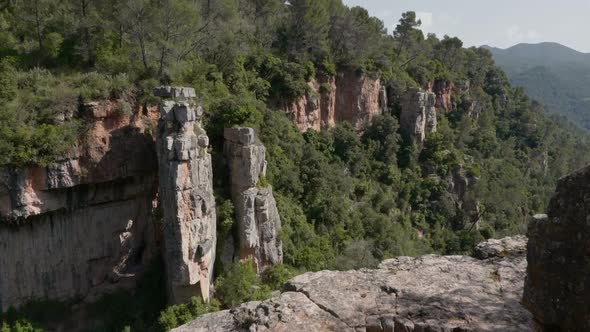 Nature Landscape Wtih Rock Formations As Columns or Pillars Rising From the Valley alt