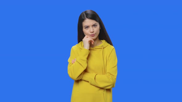 Portrait of Brunette is Thinking About Something and Then an Idea Coming to Her alt