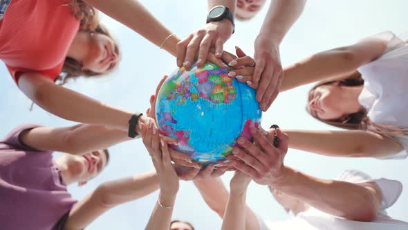 Children Holding the Earth The Future is in Their Hands alt