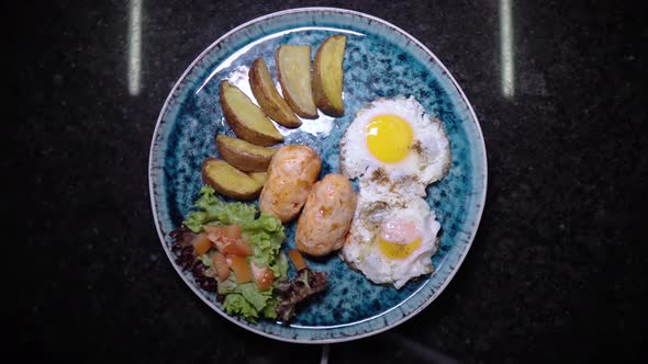 Fried Eggs with Sausages Toast and Vegetables