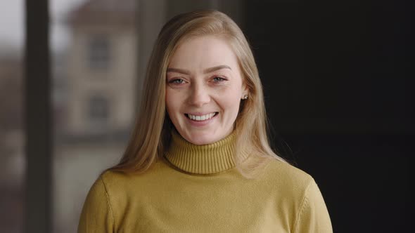 Closeup Embarrassed Positive Female Face Portrait Caucasian Blonde Girl Model Satisfied Happy Woman alt