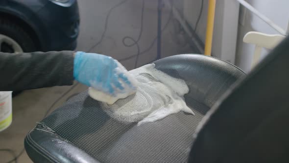 Professional car cleaning. Dry cleaning and detailing of the cabin.