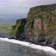 Reynisfjall tuff mountain at Reynisfjara black sand beach in Iceland - VideoHive Item for Sale