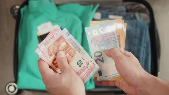 Travel After Covid 19 Coronavirus Pandemic Man Counting Euro Cash Banknotes Packing Suitcase Tourist alt