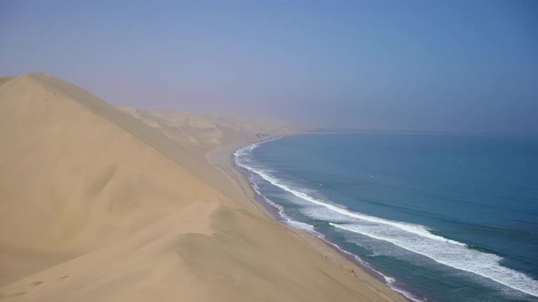 Sandwich Harbour in Namibia at the Coast of the Atlantic Ocean