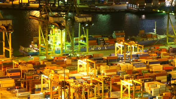 Time lapse of container cargo shipping port in Singapore alt