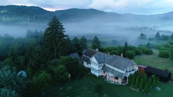 Aerial House With Fog Background