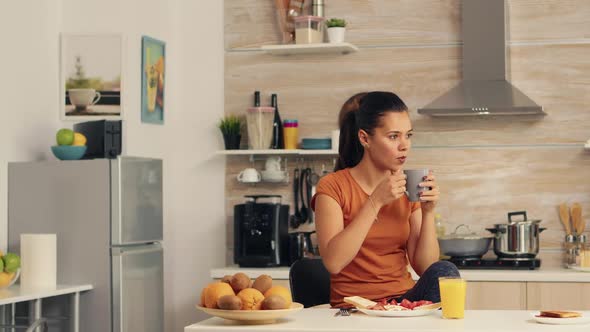 Drinking Coffee at Breakfast alt