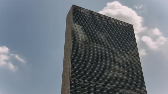  UN building facade with clouds in Manhattan - New York - USA