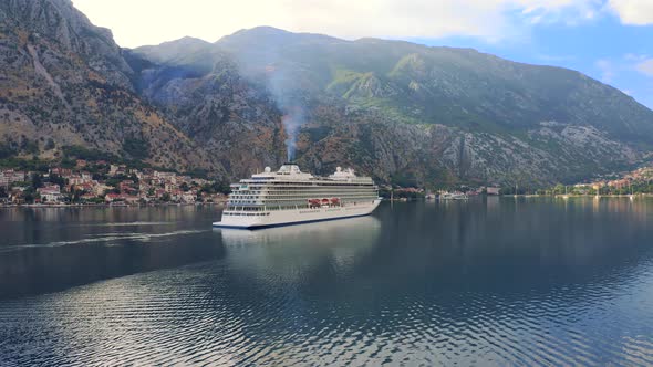 Cruise Liner Ship Swimming at Blue Adriatic Sea on Mountains Landscape Port of Kator Montenegro alt