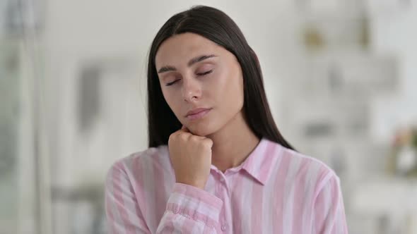 Portrait of Tired Young Latin Woman Taking Nap alt