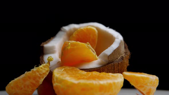 The Half of Coconut with Orange Slices Inside