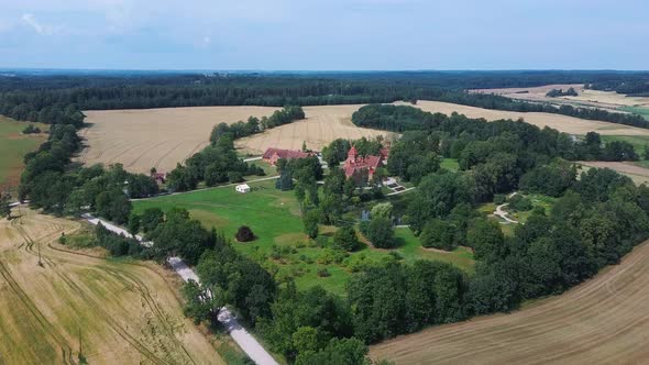 Jaunmoku Brick Medieval Castle Near Tukums, Latvia  Aerial Dron 4k Shot Jaunmokas Manor Park. alt
