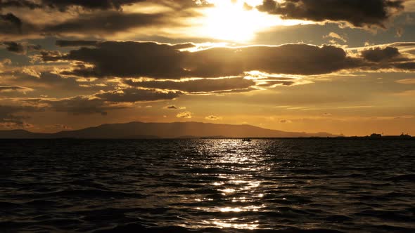 Dark Sea And Clouds In Sunset alt