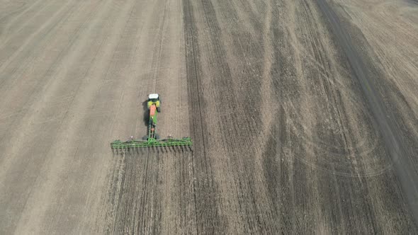 Sowing Endless Fields With Wheat. Aerial Photography alt