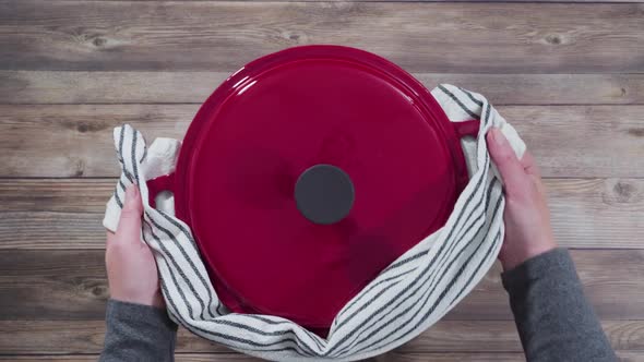 Flat lay. Baking homemade sourdough wheat bread in cast iron dutch oven alt
